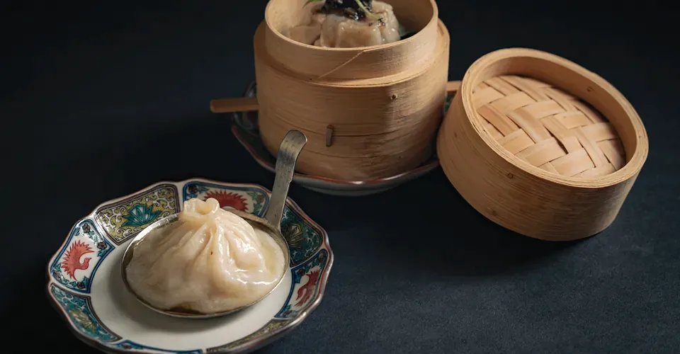 Xiaolongbao and bamboo steamers at Yakitori Suzune